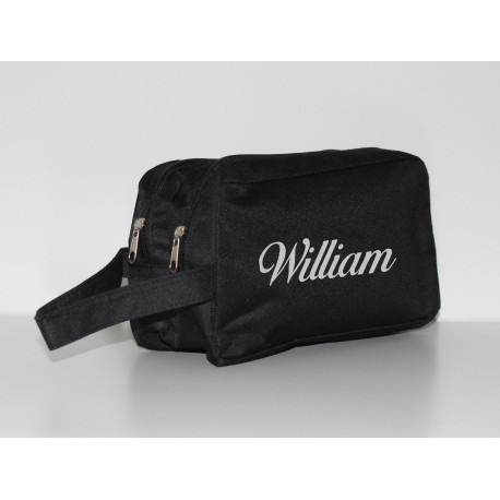 Sort toilettaske med navn på