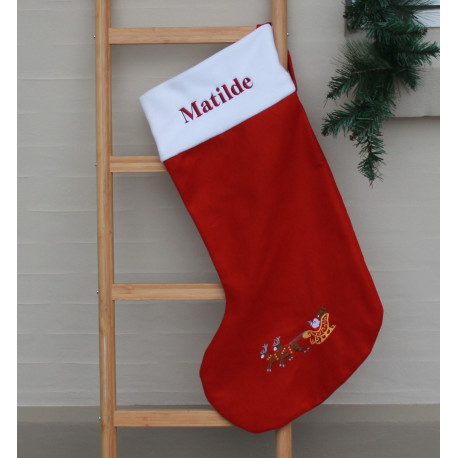 Stor rød julesok med navn og kane på